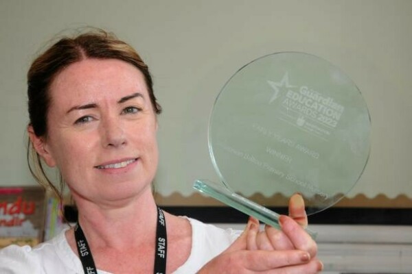 Alderman EYFS 3 Christina Richards, Early Years Lead at Alderman Bolton, holding the award