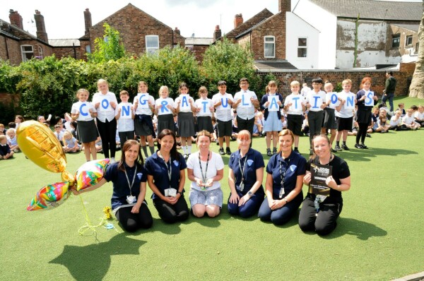 Alderman EYFS Alderman Bolton EYFS team celebrating their award with pupils