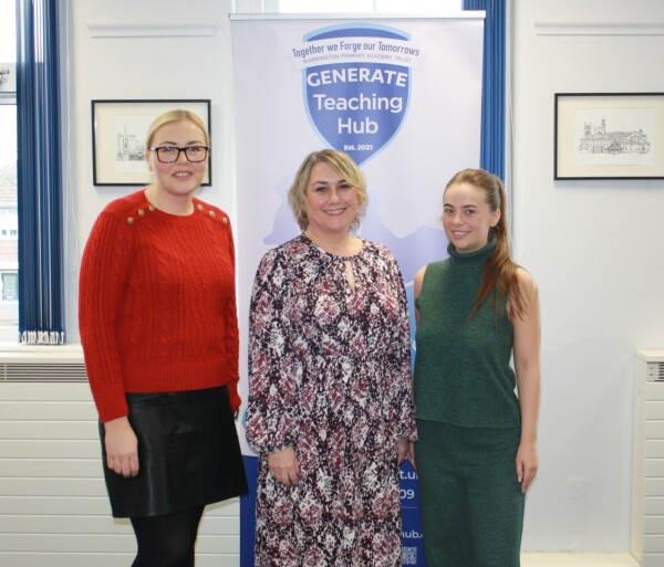 Image of Generate Teaching Hub team in their office following a successful report