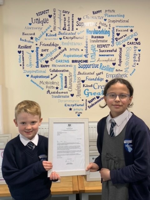 thumbnail IMG 3404 Bruche pupils Areen Sheli and Henry Melia smile with letter from Damian Hinds, School Minister